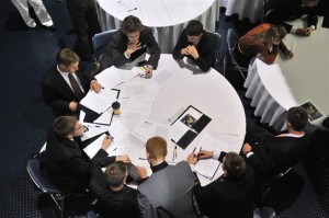 students focus at conference table